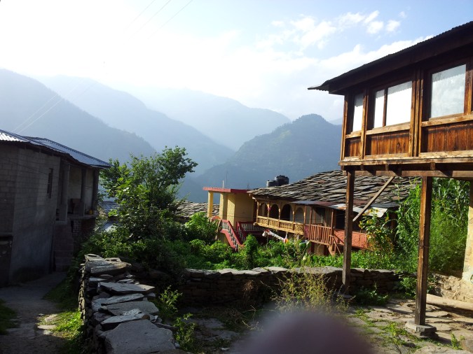 We went past the narrow pathway, people's house and their yards to the creek